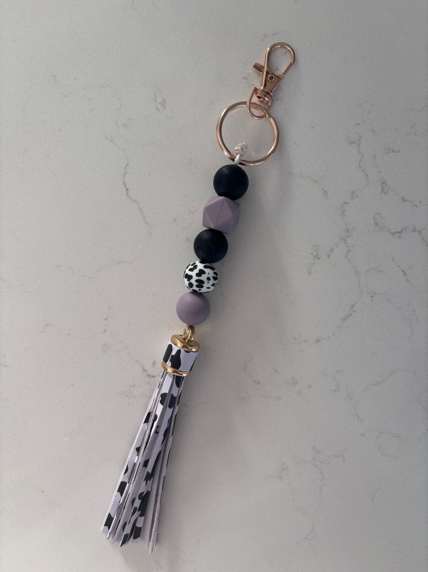 Cowgirl Creations Purple Cowprint Tassle Silicone Bead Keychain